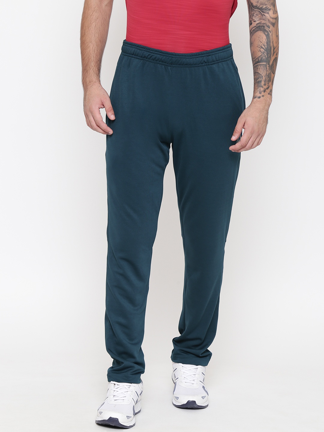 

Reebok Men Green Solid CORE Training Track Pants