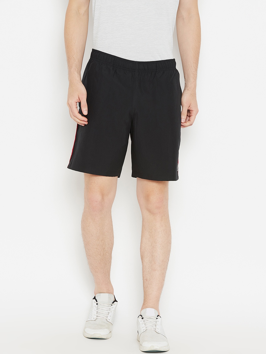

Reebok Men Black Solid Regular Fit Sports Shorts