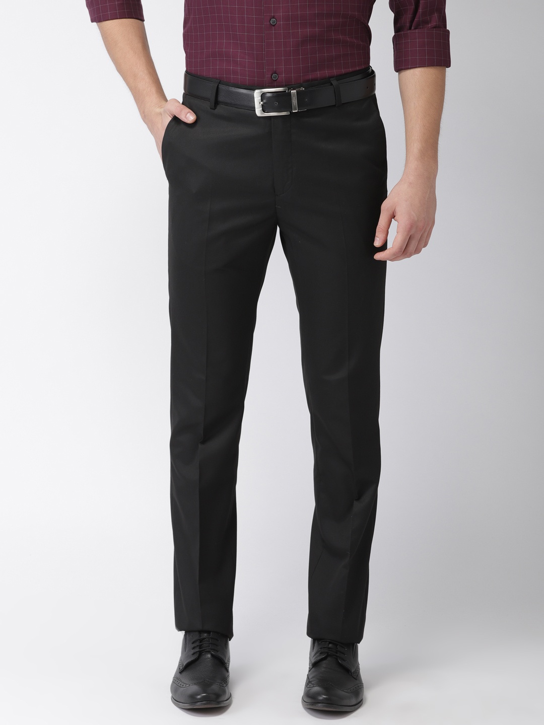 

Arrow Men Black Tapered Fit Solid Formal Trousers