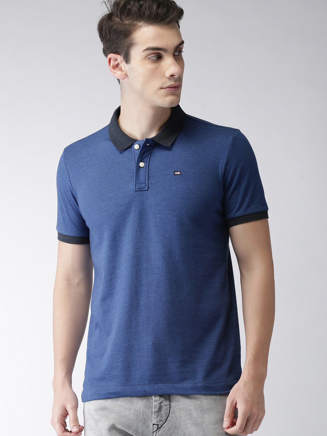 

Arrow Sport Men Blue Solid Polo T-shirt