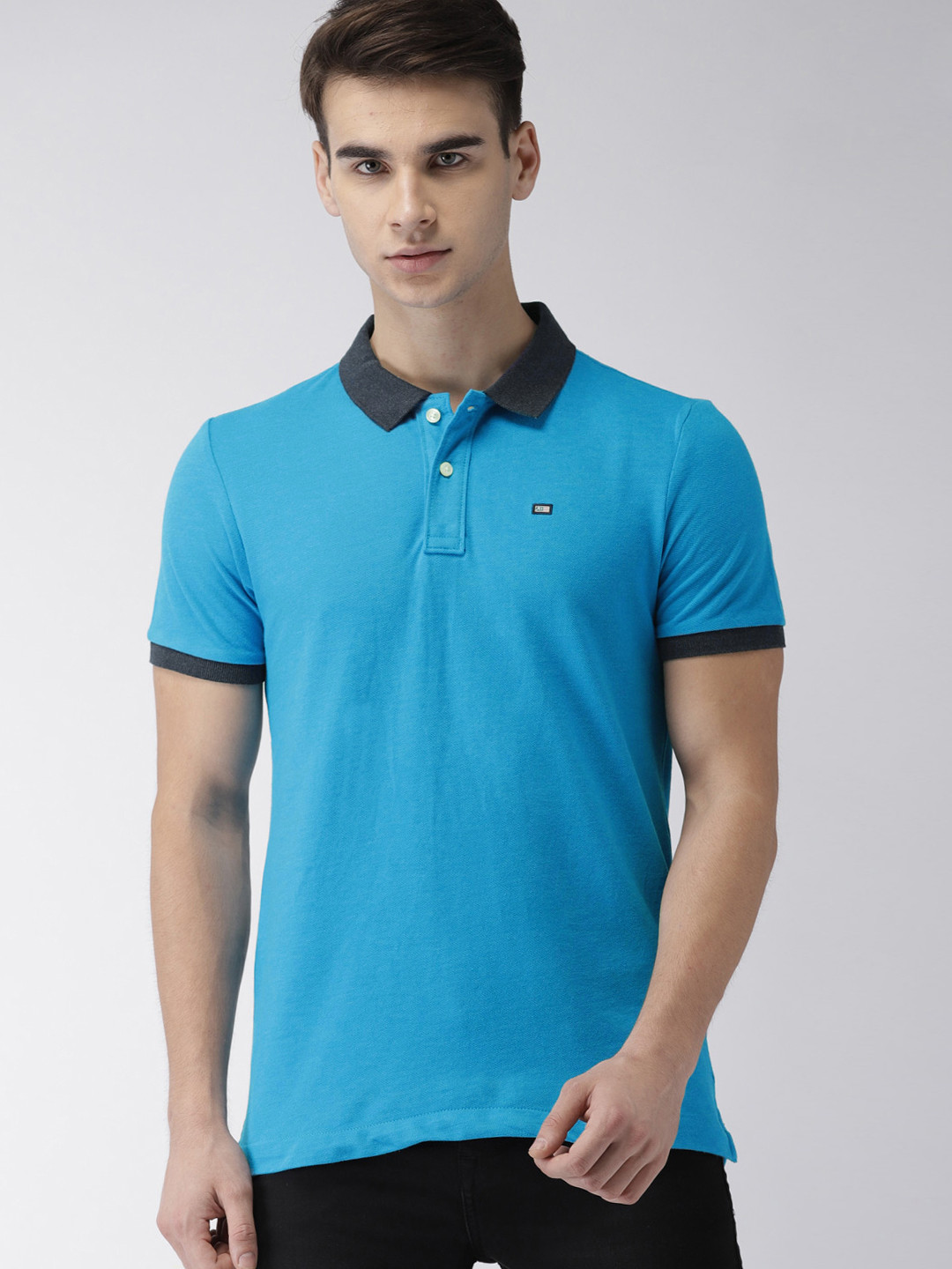 

Arrow Sport Men Blue Solid Polo Collar T-shirt
