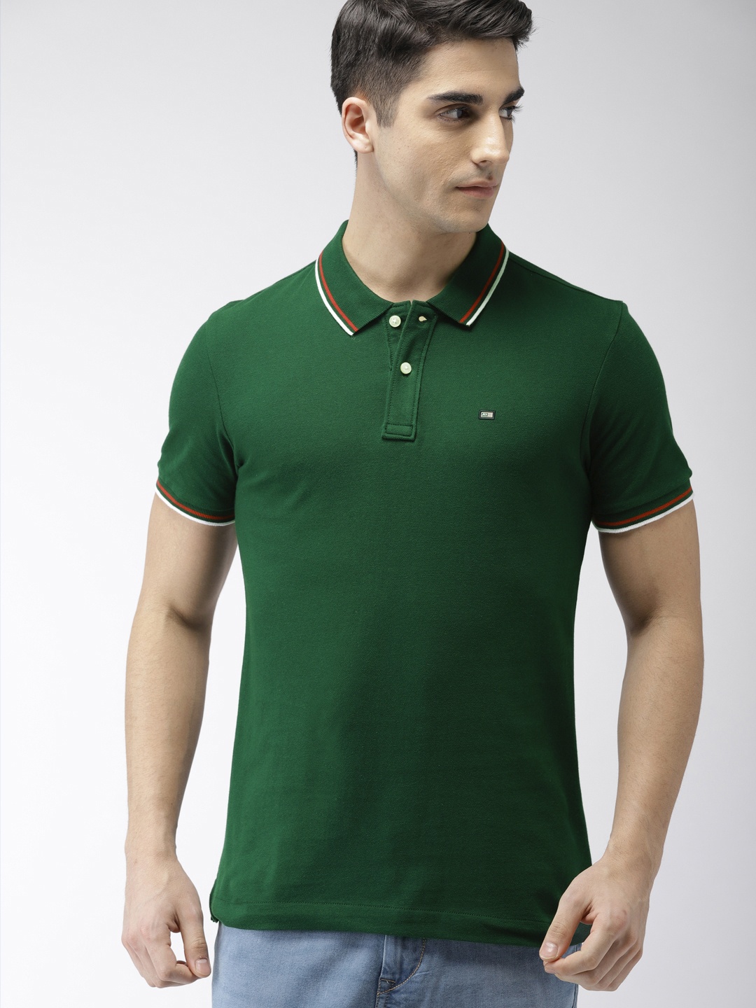 

Arrow Sport Men Green Solid Polo Collar T-shirt