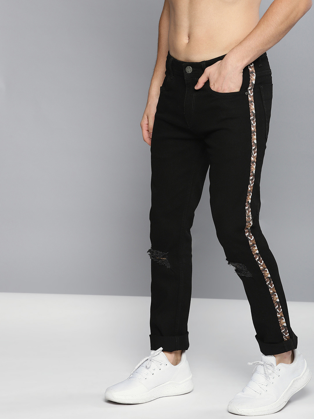 

Kook N Keech Men Black Skinny Fit Mid-Rise Ripped Stretchable Jeans