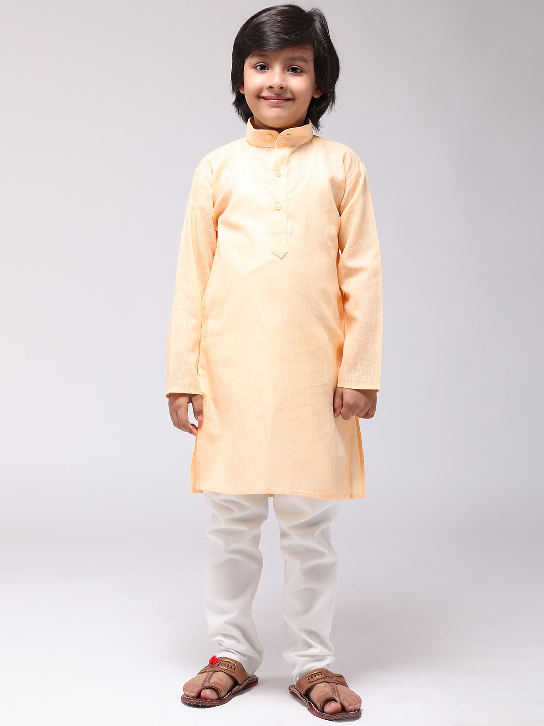 

SOJANYA Boys Yellow & Off-White Solid Kurta with Churidar