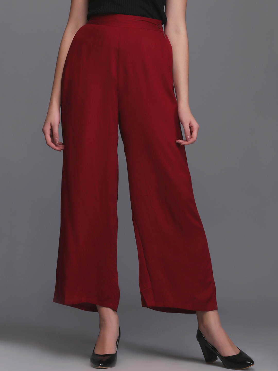 

Ojjasvi Women Maroon Wide Leg Solid Palazzos