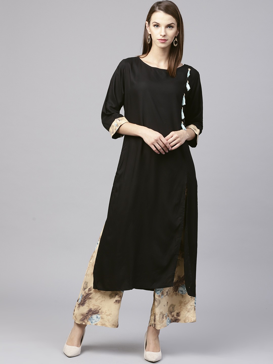 

Shree Women Black & Beige Solid Kurta with Palazzos