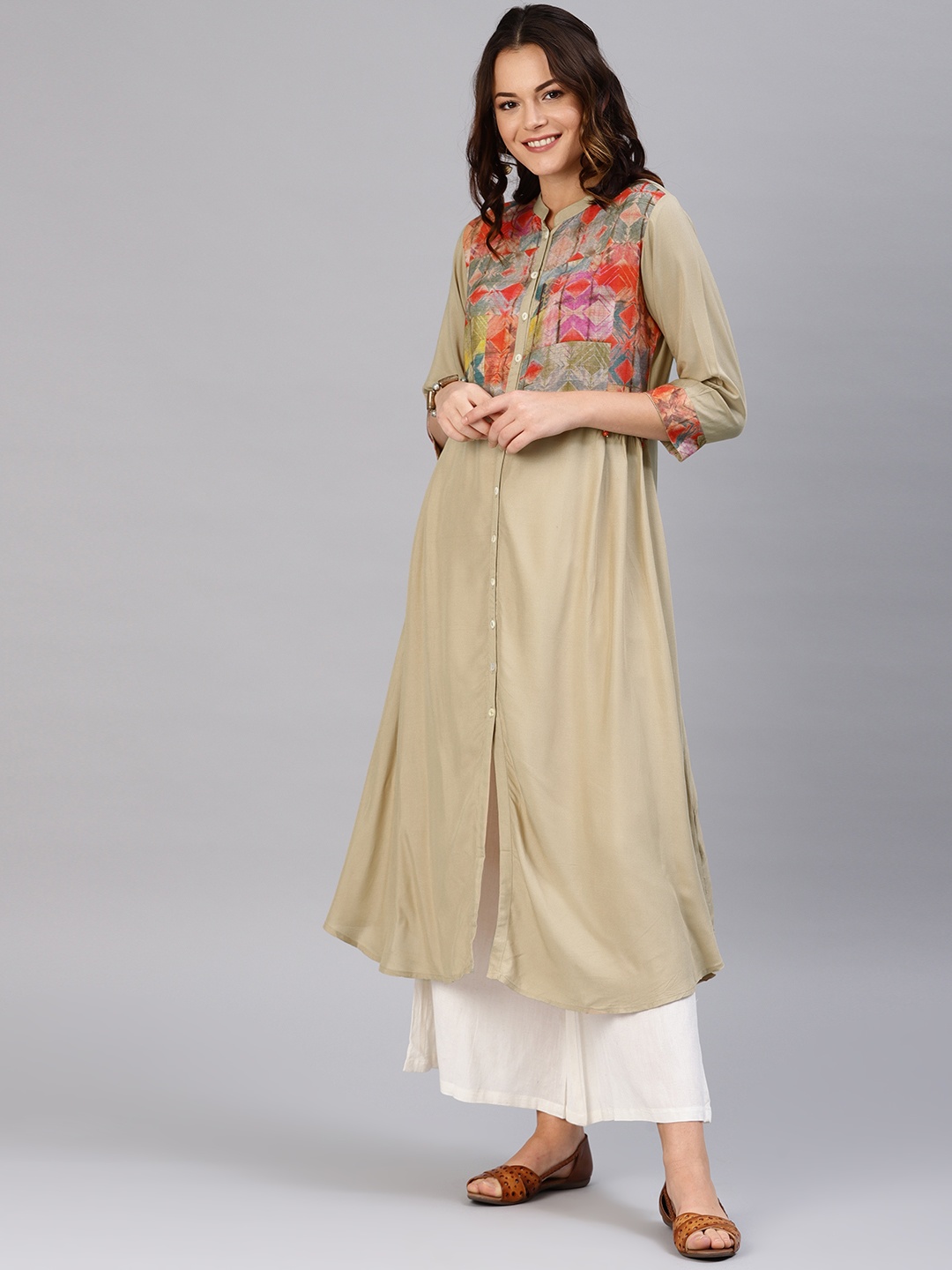 

Shree Women Beige Yoke Design A-Line Kurta