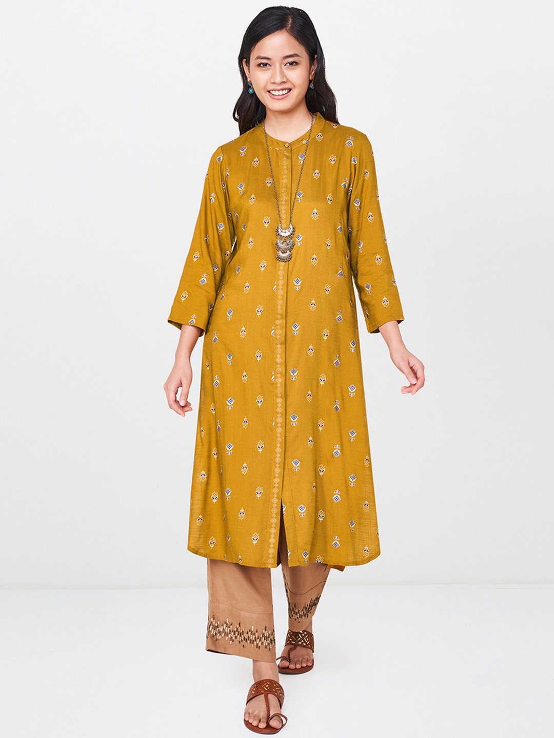 

Global Desi Women Mustard Yellow Printed A-Line Kurta