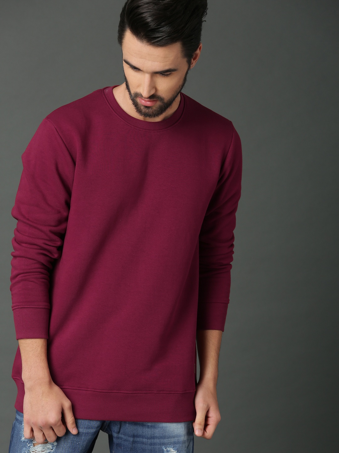 

Roadster Men Maroon Solid Sweatshirt