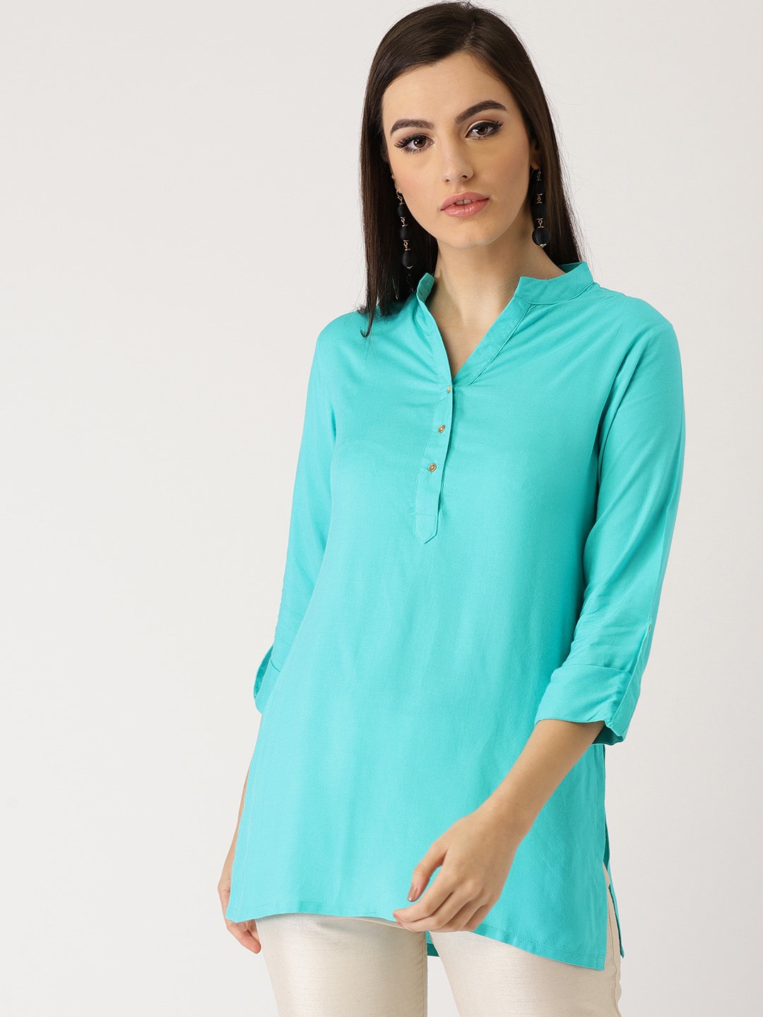 

Libas Women Turquoise Blue Solid A-Line Kurti
