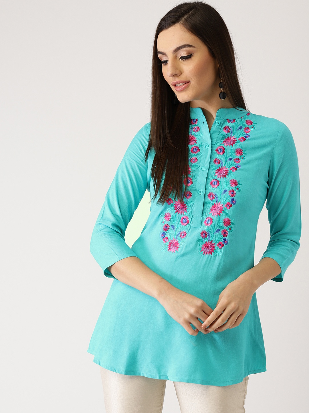 

Libas Women Turquoise Blue Embroidered A-Line Kurti