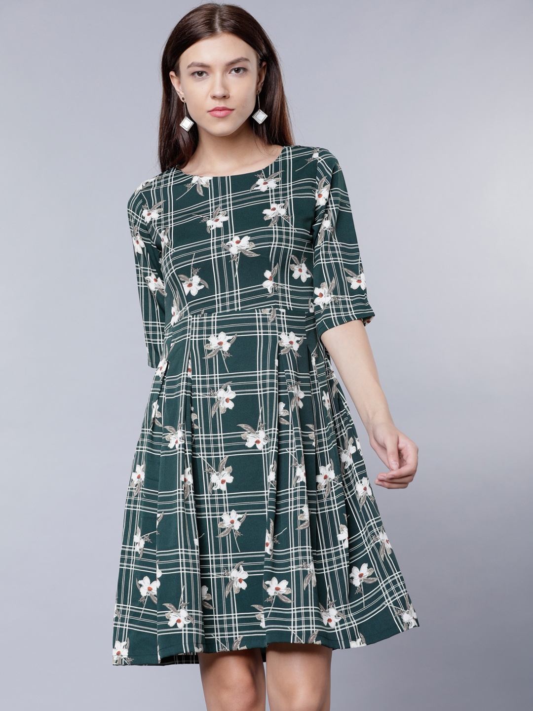 

Tokyo Talkies Women Green Printed Fit and Flare Dress