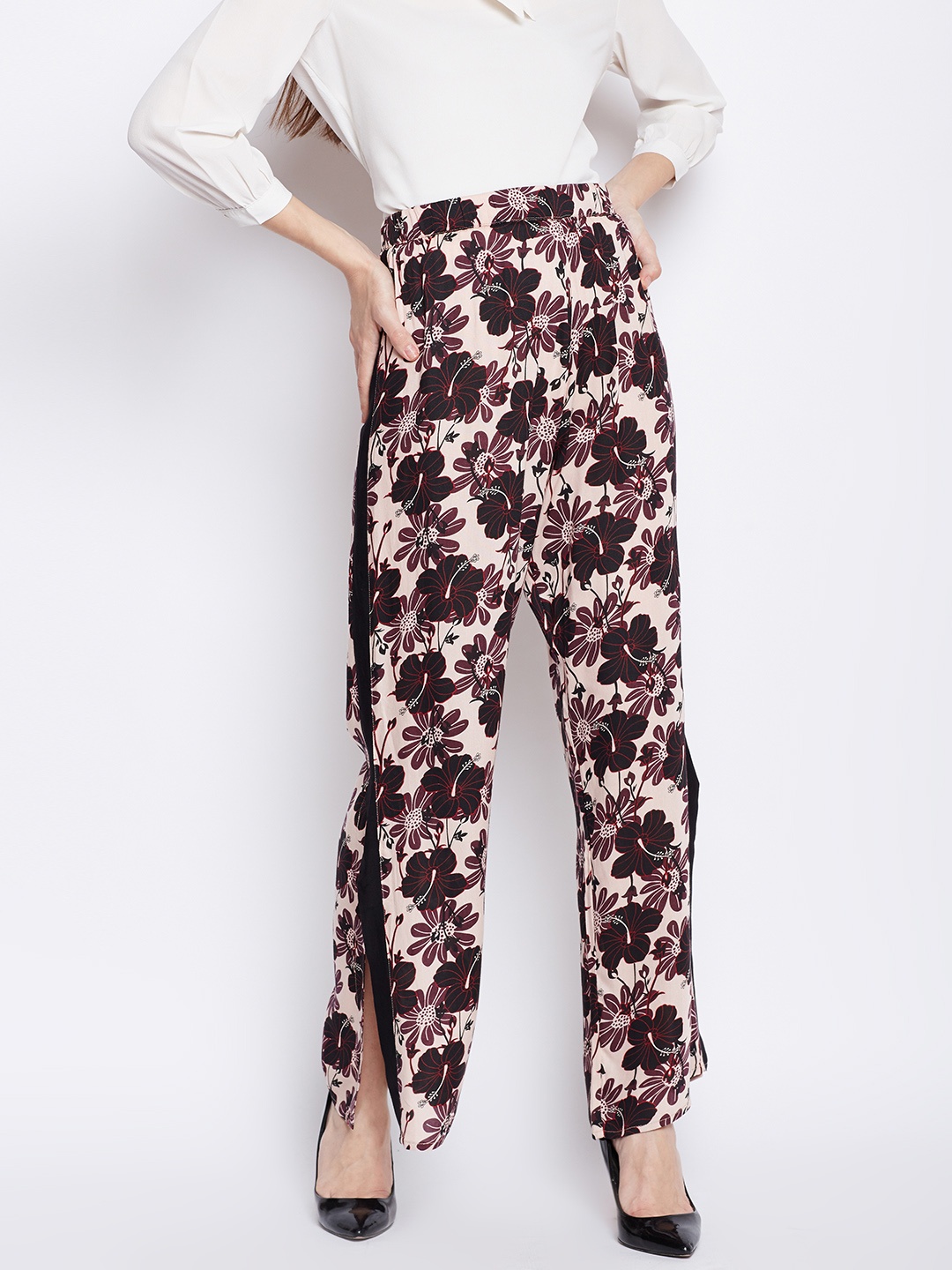 

Oxolloxo Women Beige & Brown Regular Fit Printed Regular Trousers