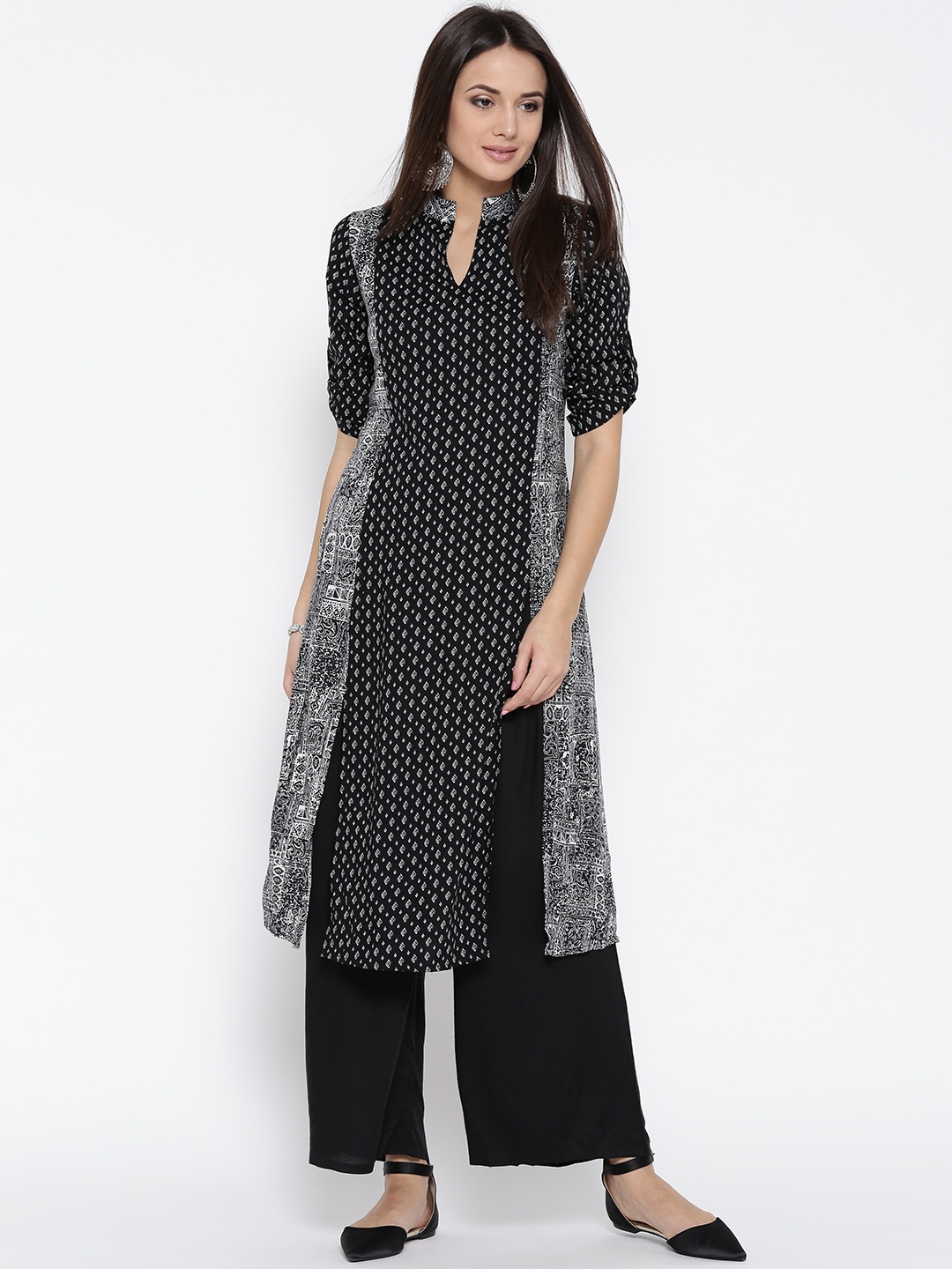 

Sera Women Black Printed Kurta with Palazzos