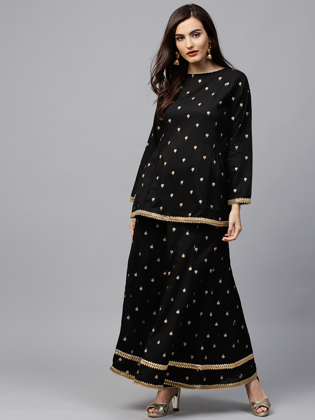 

Bhama Couture Women Black & Golden Printed Kurti with Palazzos