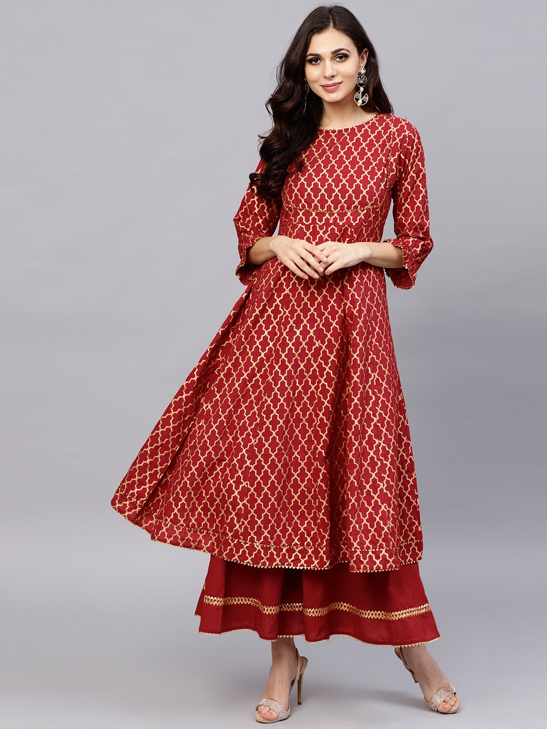 

Bhama Couture Women Maroon & Golden Printed Kurta with Palazzos
