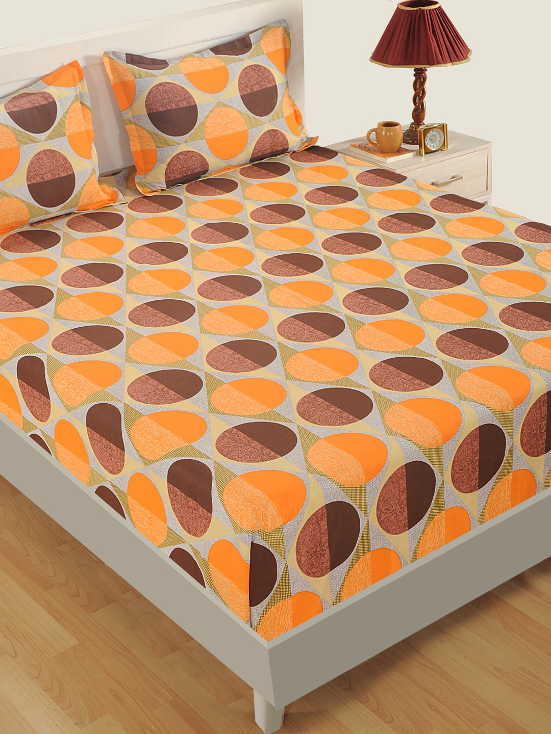 

SWAYAM Orange & Brown Geometric Fitted 160 TC Cotton 1 Queen Bedsheet with 2 Pillow Covers