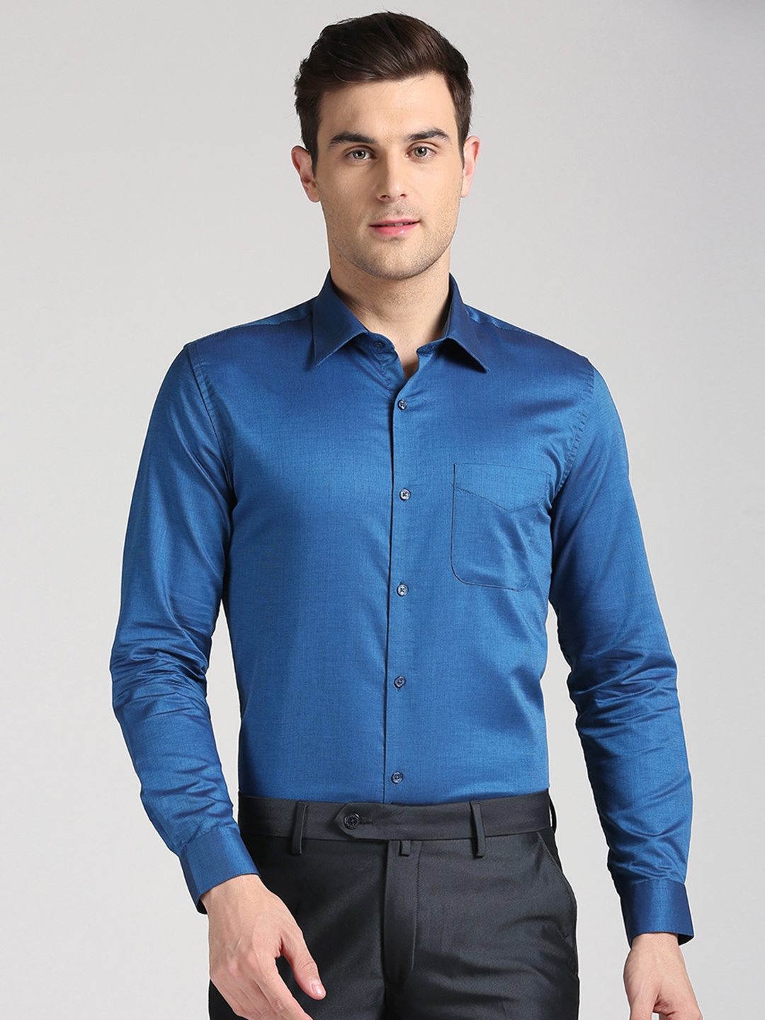 

Peter England Elite Men Blue Slim Fit Solid Casual Shirt