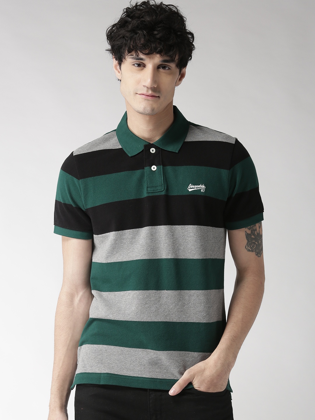 

Aeropostale Men Green Striped Polo Collar T-shirt