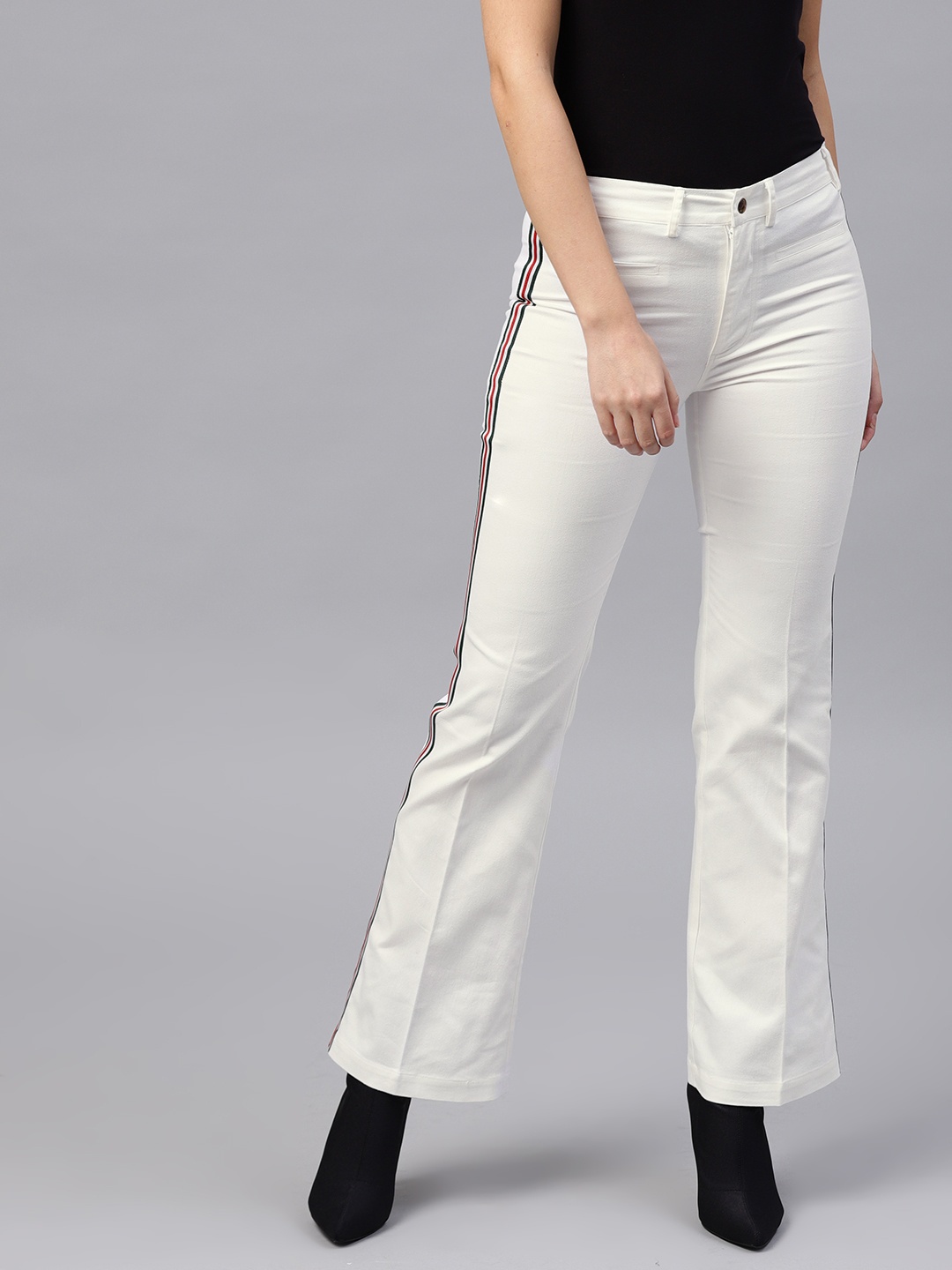 

SASSAFRAS Women White Solid Regular Fit Bootcut Trousers