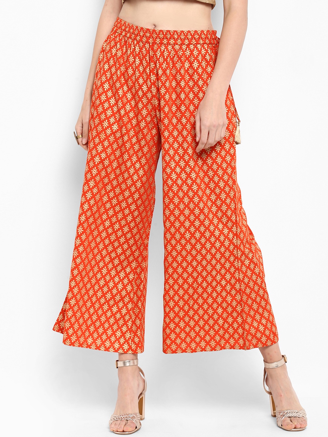 

Varanga Women Orange Printed Flared Palazzos