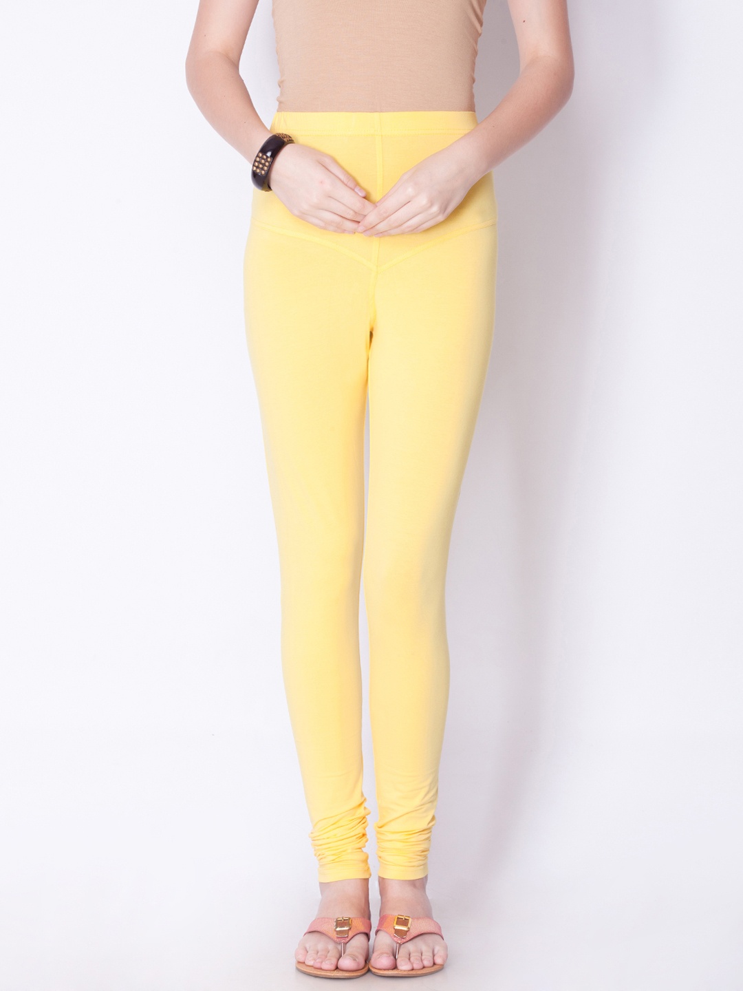 

Dollar Missy Women Yellow Solid Churidar Leggings