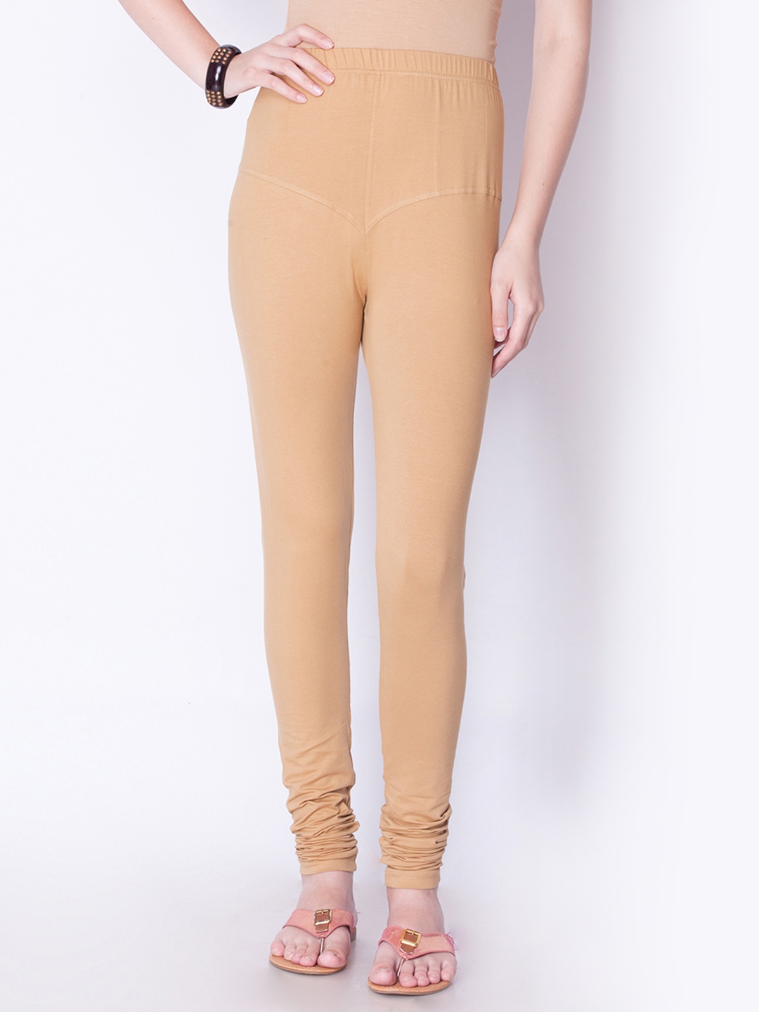 

Dollar Missy Women Beige Solid Churidar Leggings