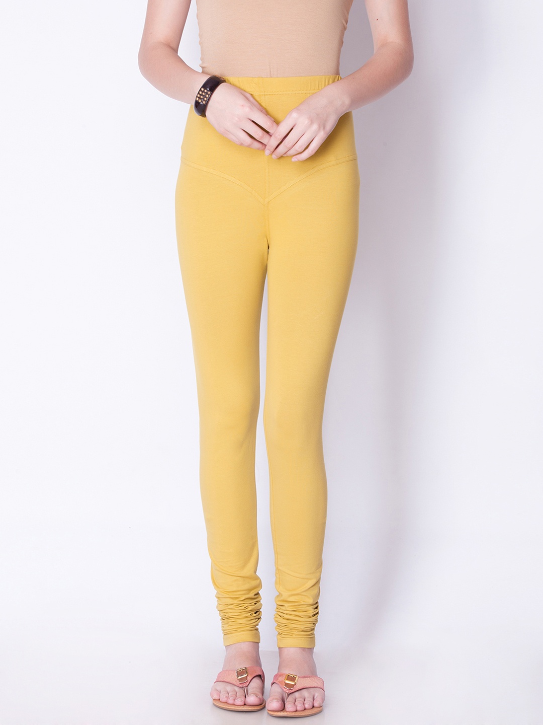 

Dollar Missy Women Mustard Yellow Solid Churidar Leggings