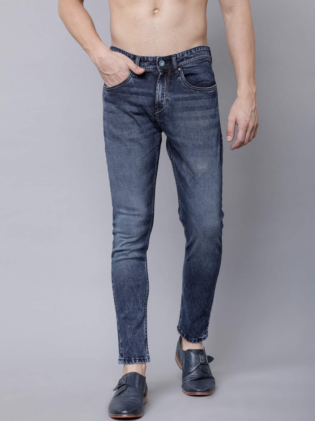 

LOCOMOTIVE Men Blue Tapered Fit Mid-Rise Clean Look Stretchable Jeans