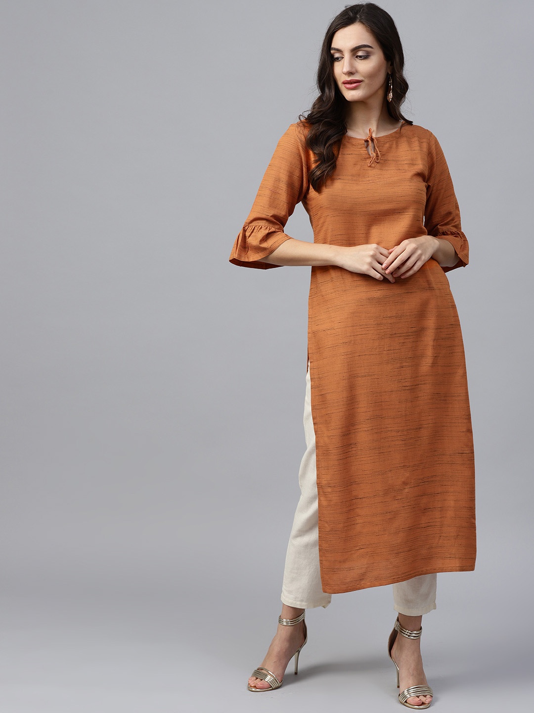 

Gerua By Libas Women Orange Black Self Design Straight Kurta