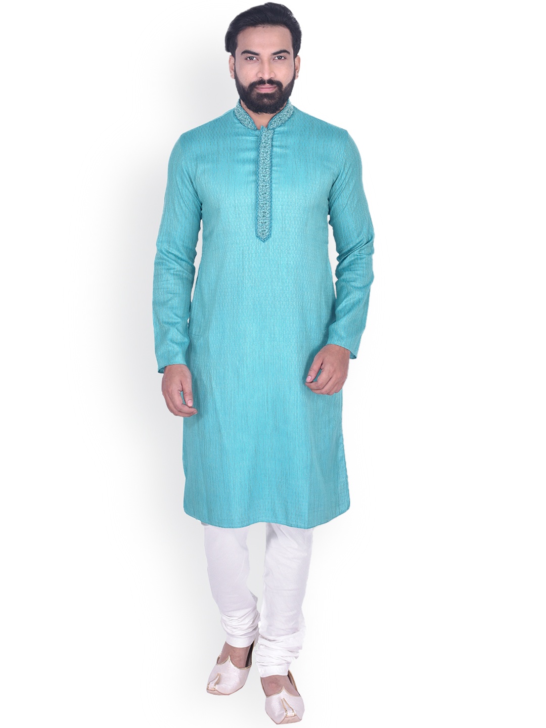 

Manyavar Men Sea Green Solid Kurta with Churidar