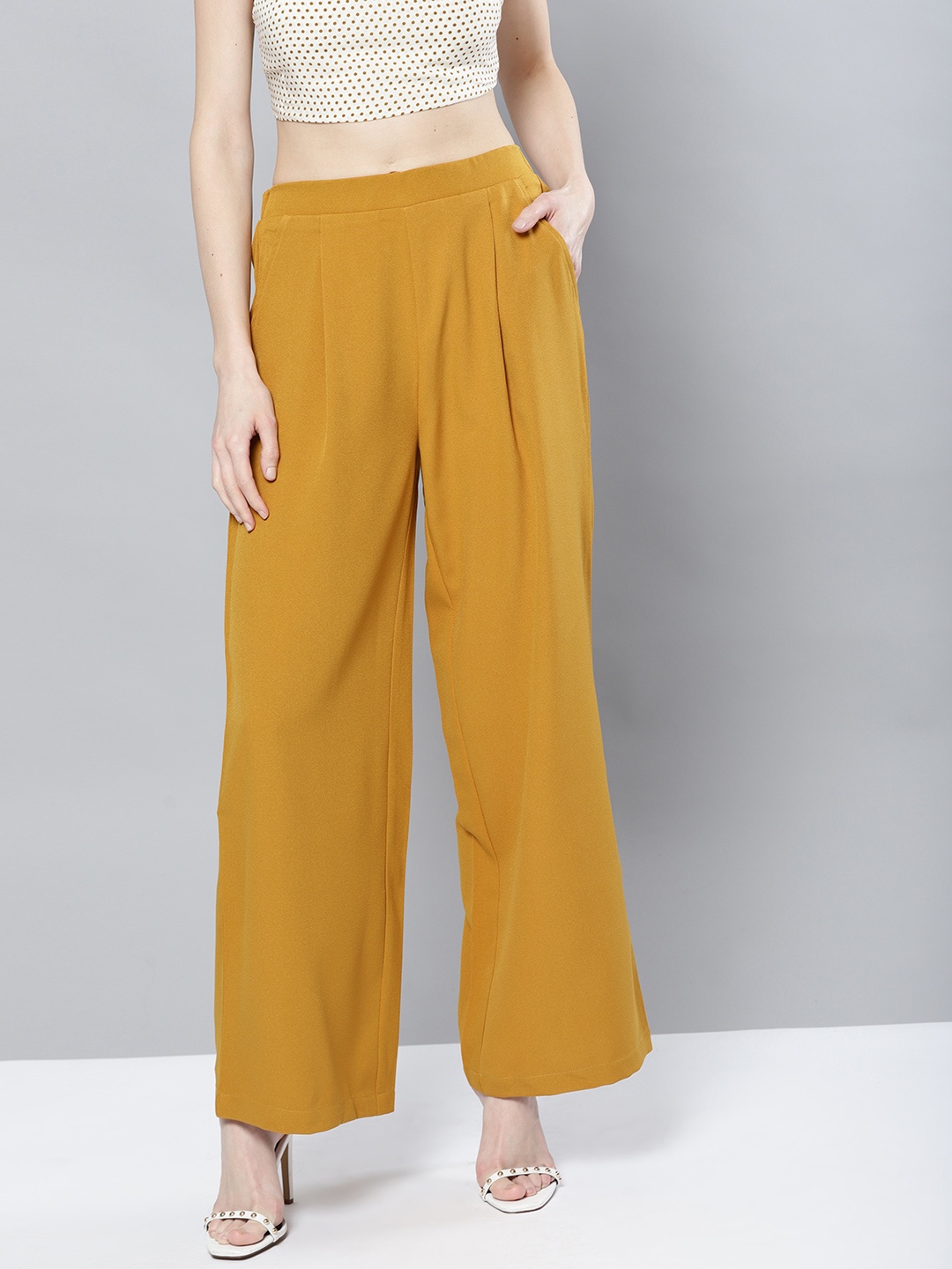 

Harpa Women Mustard Yellow Regular Fit Solid Parallel Trousers