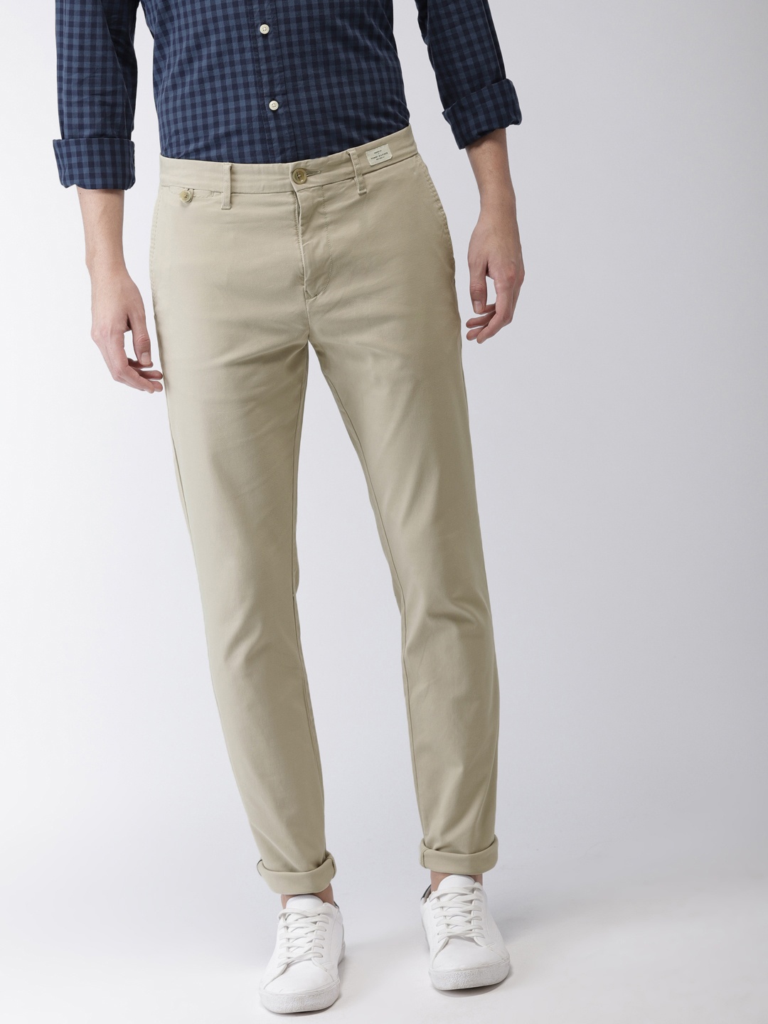 

Tommy Hilfiger Men Beige Straight Fit Solid Chinos