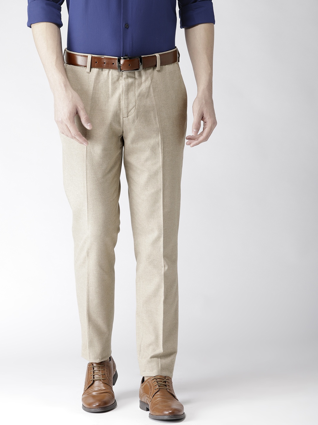 

Tommy Hilfiger Men Beige Regular Fit Solid Trousers