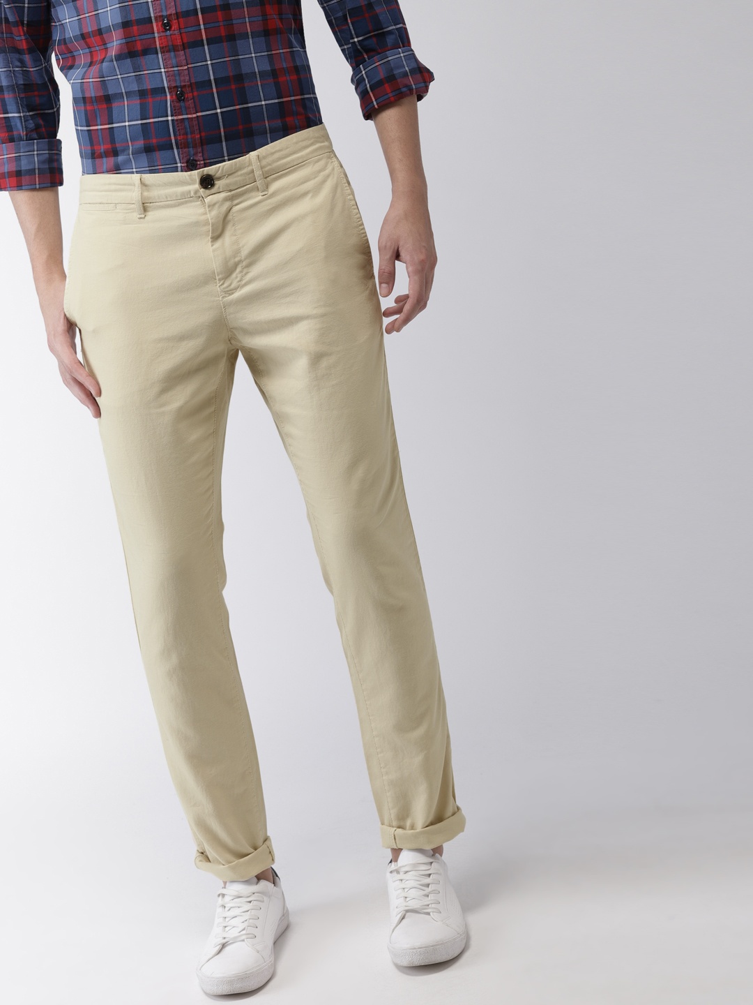 

Tommy Hilfiger Men Beige Straight Fit Solid Chinos