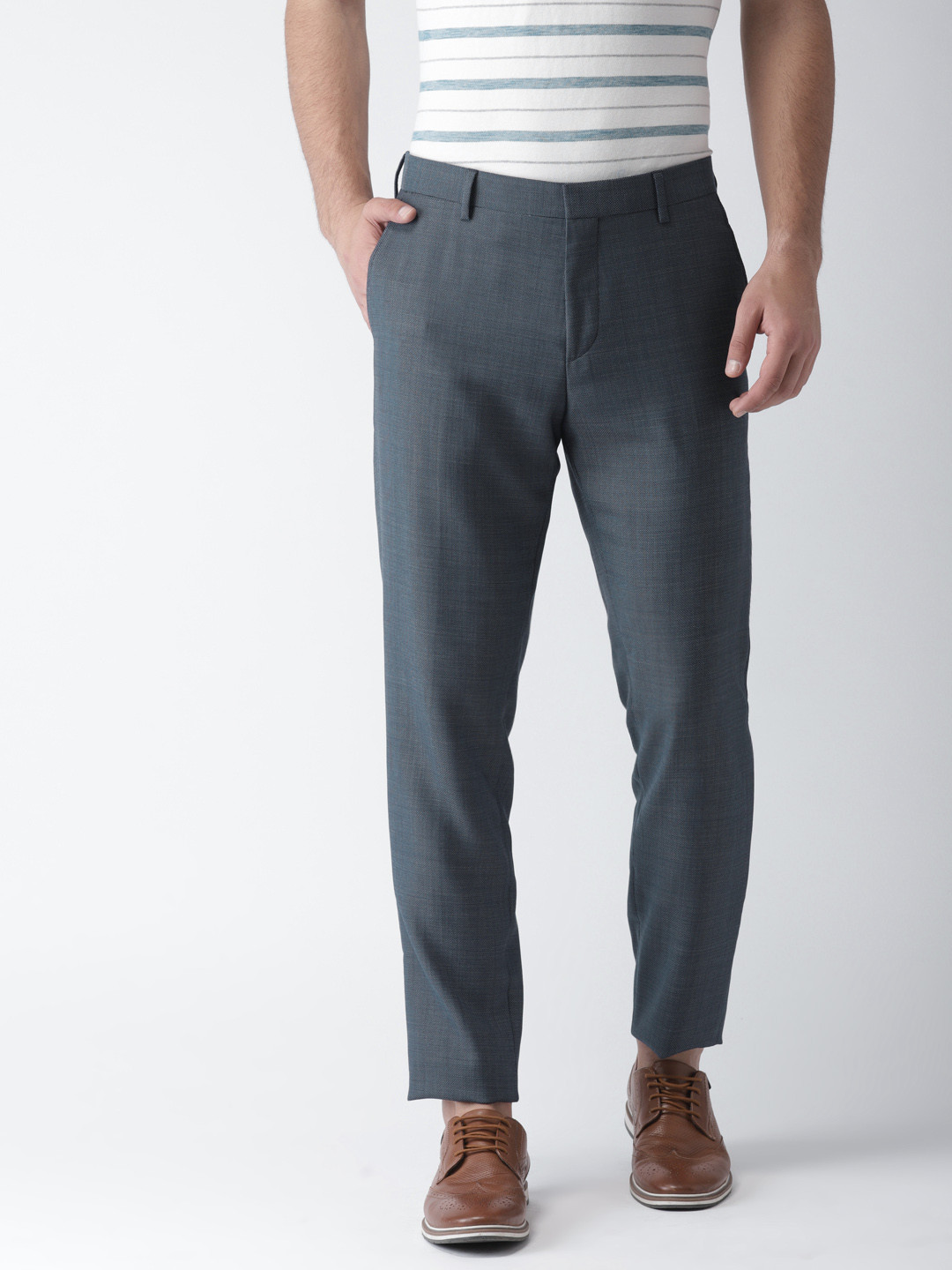 

Tommy Hilfiger Men Blue Regular Fit Self Design Regular Trousers