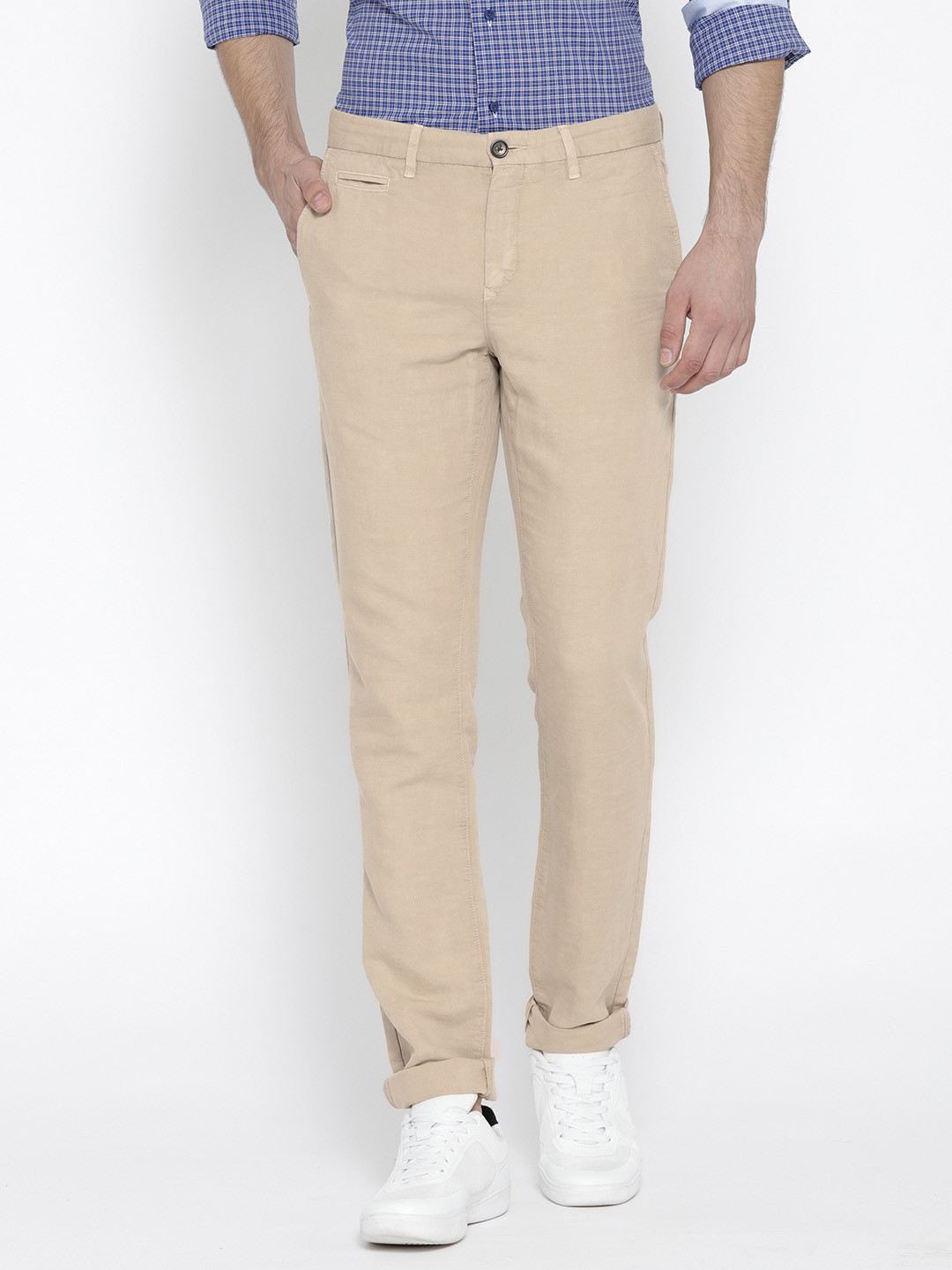 

Tommy Hilfiger Men Beige Regular Fit Solid Trousers