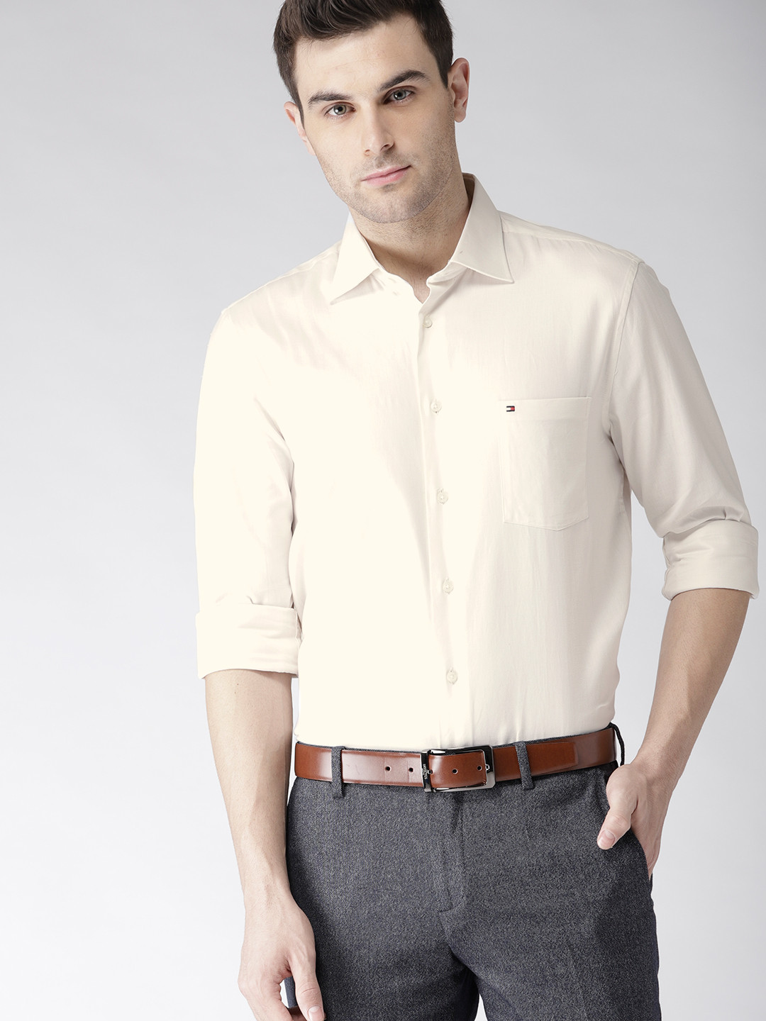 

Tommy Hilfiger Men Off-White Regular Fit Solid Smart Casual Shirt