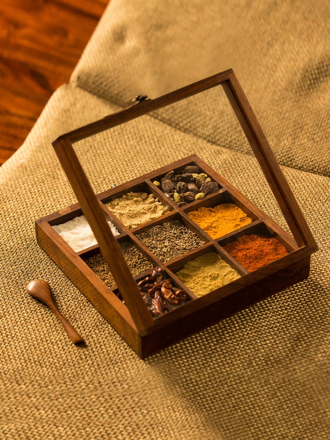 

ExclusiveLane Brown Handcrafted Sheesham Wooden Spice Box With Spoon