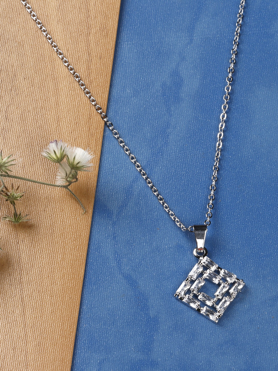 

Priyaasi Silver-Plated Stone-Studded Diamond Shaped Pendant with Chain
