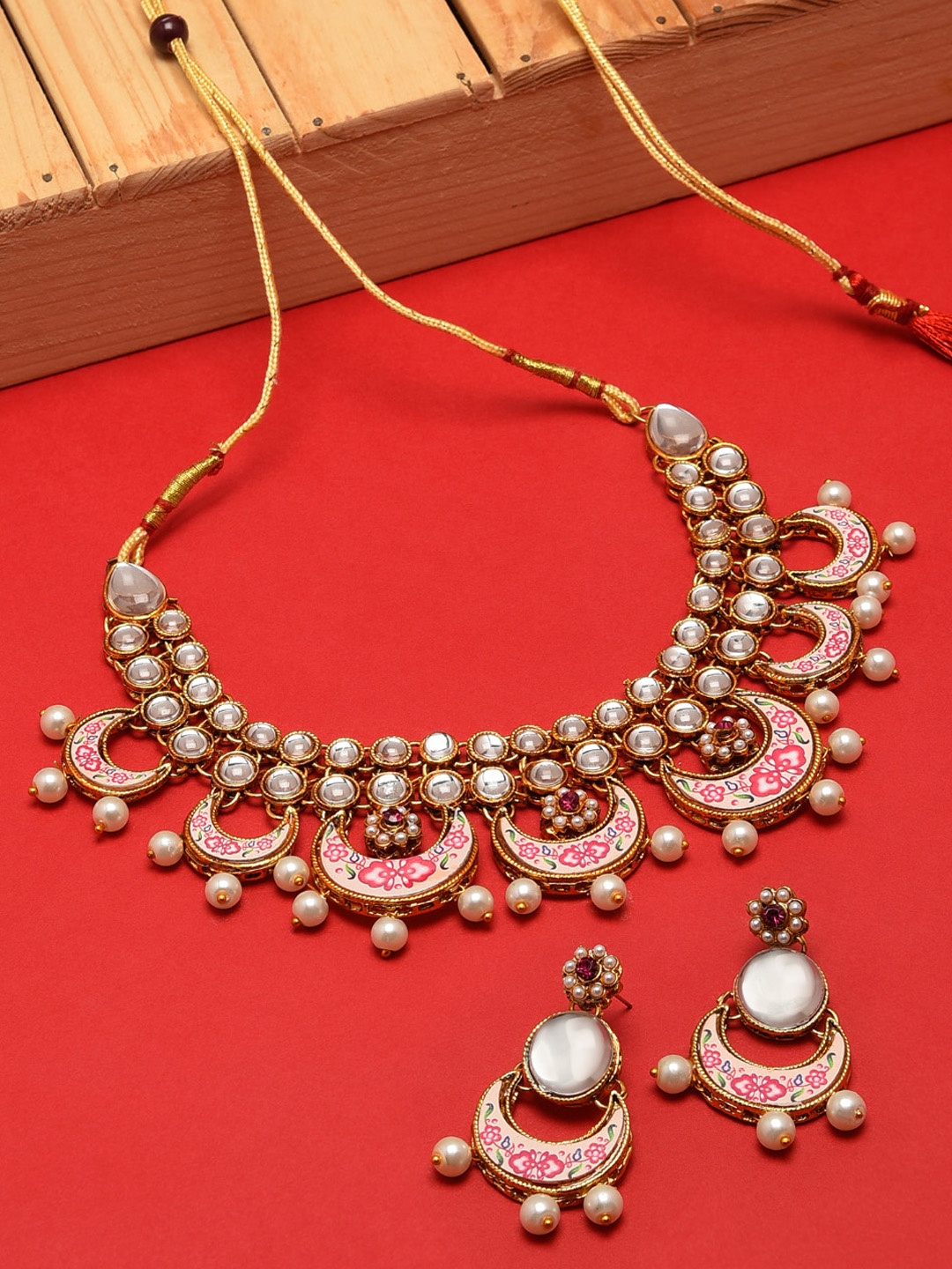 

Zaveri Pearls Gold-Toned Kundan Mesmerising Traditional Jewellery Set