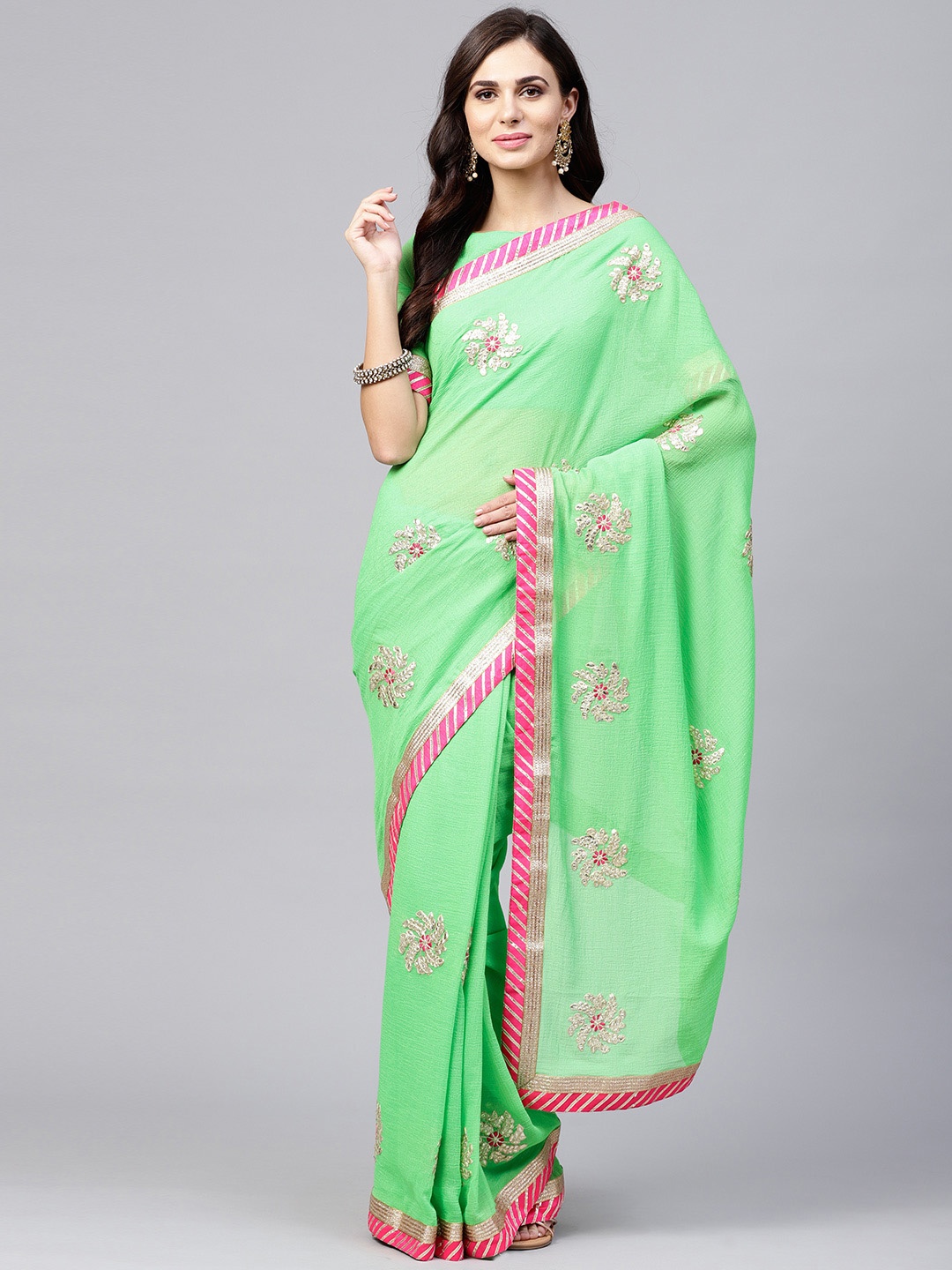 

Saree mall Green & Magenta Embellished Partywear Saree