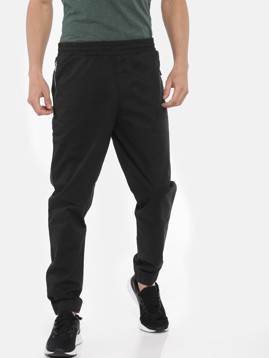 

Puma Men Black Solid Regular Fit Athletics Premium Joggers