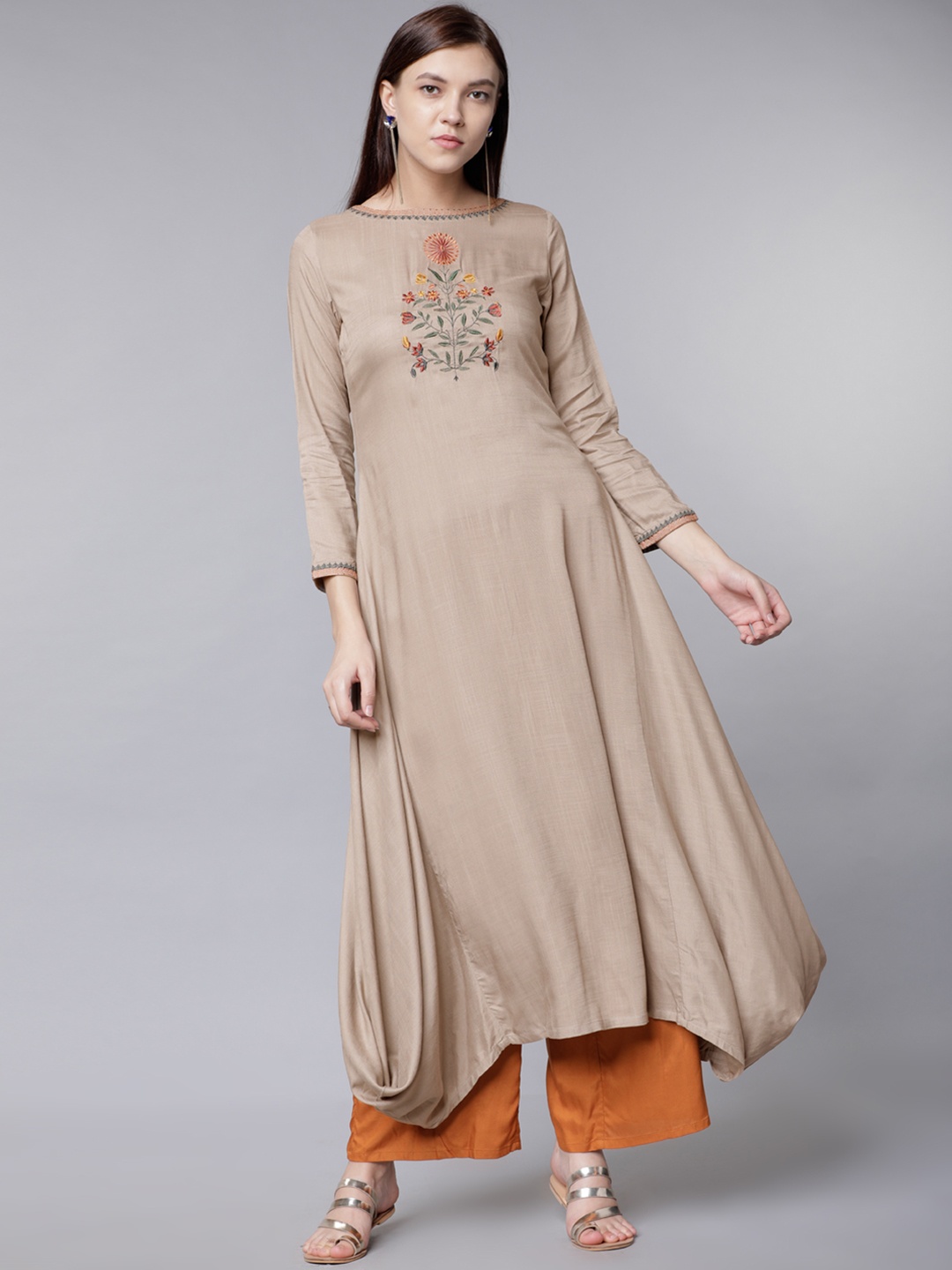 

Vishudh Women Beige Embroidered A-Line Asymmetric Kurta