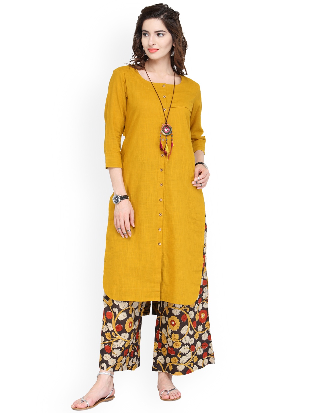 

Varanga Women Yellow Solid Straight Kurta