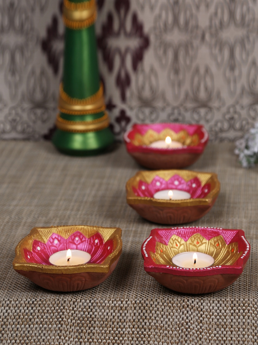 

Aapno Rajasthan Multi-Coloured Handpainted Set Of 4 Matki Diya