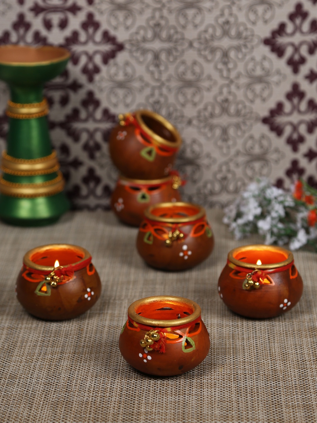 

Aapno Rajasthan Brown Handpainted Set of 4 Diwali Diya