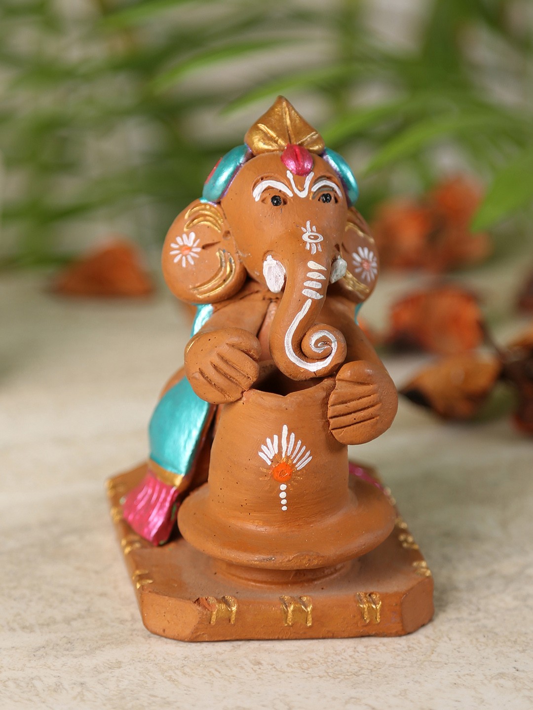 

Aapno Rajasthan Brown Handcrafted Ganesha Showpiece