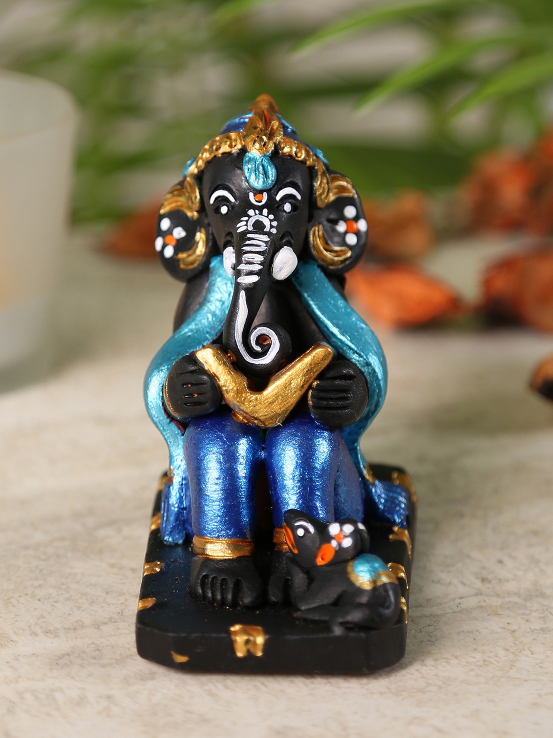 

Aapno Rajasthan Brown Handcrafted Ganesha Showpiece