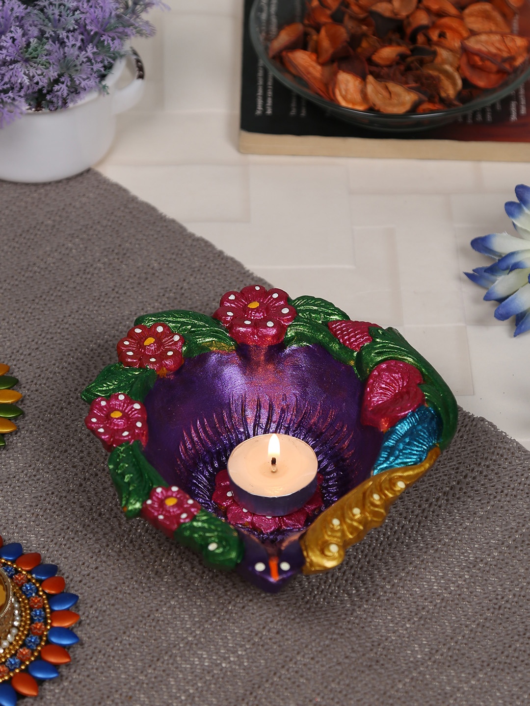

Aapno Rajasthan Multicoloured Hand-Painted Floral Diya, Multi
